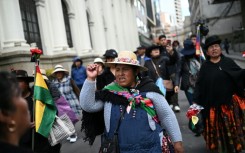Indigenous women take part in a protest against the government of Bolivian President Rodrigo Paz