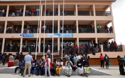 Parents were kept outside the school buildings by authorities as investigators raced to identify the victims of the fire