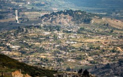 Destroyed buildings in the south Lebanon village of Kfarkila, as seen from across the border in Israel