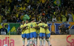 Brazil's players celebrate Vinicius Jr's opening goal in a 6-2 thrashing of Panama at the Maracana Stadium