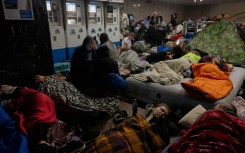 People take shelter at a metro station during an air alarm in Kyiv on June 2, 2026, amid the Russian invasion of Ukraine