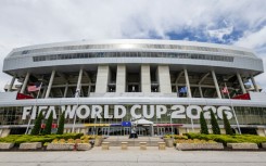 A freshly installed FIFA World Cup 2026 sign hangs over the entrance at Kansas City Stadium