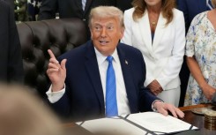US President Donald Trump speaks during a signing ceremony for the "Secure America Act" in the Oval Office of the White House