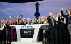 SpaceX employees celebrate the company's Wall Street debut, the largest initial public offering in US history