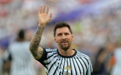 Lionel Messi waves to fans in Kansas City