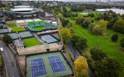 An aerial photograph taken on October 14, 2024 show a general view of the All England Lawn Tennis Club and of the Wimbledon Park Golf Course southwest London