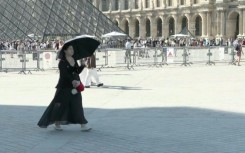 Amid a heatwave, France presses ahead with street music festivals