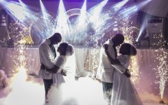 Twin brothers Taiwo and Kehinde Oguntoye dance with twin sisters Taiwo and Kehinde Adediran at their double wedding reception