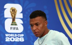 Kylian Mbappe at a press conference in Philadelphia on Sunday -- he is set to win his 100th cap for France in Monday's World Cup clash with Iraq