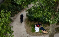 People have taken to the shade to try to beat the heatwave in France