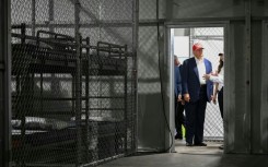 US President Donald Trump, pictured visiting 'Alligator Alcatraz' in 2025, has vowed to deport millions of undocumented migrants