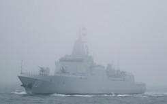 The Renhai-class destroyer Nanchang of the Chinese People's Liberation Army Navy sails off the coast of Qingdao in eastern China