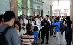 Men, women and children have queued in the streets to obtain documents and attend appointments for their regularisation