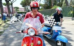 Vespa aficionados converged on Rome for a colourful if noisy zip around the streets of the Italian capital