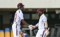 Amir Jangoo (R) will resume on the third morning on 78 in partnership with Roston Chase (L), who is 42 not out