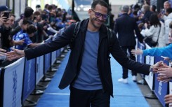 Liam Rosenior is greeted by Chelsea fans before a Premier League match against visiting Manchester City on April 12, ten days before he was fired