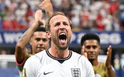 England captain Harry Kane celebrates after scoring the goals that saw England defeat DR Congo 2-1