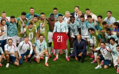 Cristiano Ronaldo and teammates celebrate with a shirt in commemoration of late teammate Diogo Jota after their win over Portugal