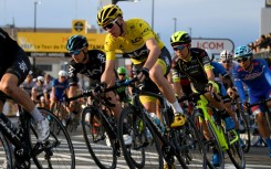 Chris Froome (C), pictured at the 2017 Saitama Criterium, won the Tour de France four times