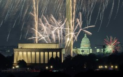 Independence Day fireworks go off over the National Mall in Washington, DC, as seen from the area of the US Marine Corps War Memorial in Arlington, Virginia, on July 4, 2024