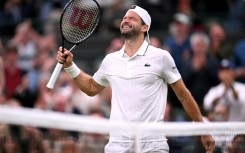 Bulgaria's Grigor Dimitrov celebrates beating Jakub Mensik at Wimbledon