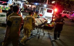 An AFP journalist saw several body bags on the ground outside the Rong Beer Na Lat Phrao bar and restaurant early Monday morning.
