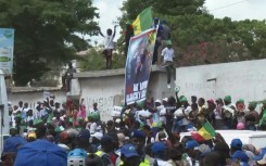 Supporters of ex-Senegal president Macky Sall gather in Dakar to welcome him