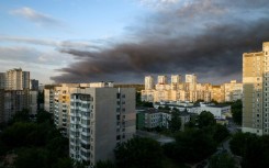Smoke hangs in the air following Russian missile strikes on Kyiv on July 19, 2026