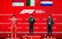 Belgian Grand Pirx winner Kimi Antonelli (C) is flanked by Charles Leclerc (L) who came second and Max Verstappen who was third