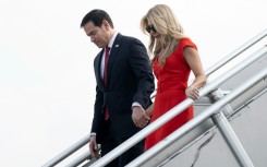 US Secretary of State Marco Rubio and his wife Jeanette Dousdebes Rubio arrive in Manila on July 21, 2026, ahead of the Association of Southeast Asian Nations (ASEAN) Foreign Ministers' Meeting