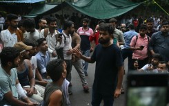 Cockroach Janta Party (CJP) founder Abhijeet Dipke speaks to people in New Delhi on July 21, 2026