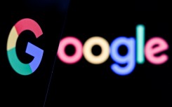 Google's stock fluctuated after hours and dropped as much as 3 percent