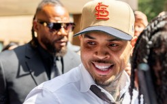 US singer Chris Brown leaves a UK court after pleading guilty to affray during a 2023 London nightclub brawl