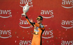Lando Norris celebrates his first grand prix win of the season in Hungary