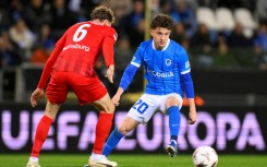 Borussia Dortmund have signed Greece midfielder Konstantinos Karetsas (R) from Genk