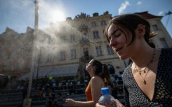 European authorities issued health warnings, battled wildfires and urged people to avoid outdoor activities during afternoons
