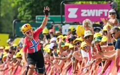 Norwegian rider Sigrid Haugset celebrates her win on stage three of the Tour de France Femmes