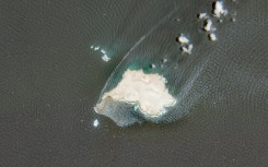 This satellite image obtained from Copernicus Sentinel Data 2026 shows a slick that is consistent with an oil leak emanating from a ship, stranded for over a month near Qibliyyah island off Oman's southern coast in the Arabian Sea