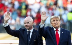 FIFA President Gianni Infantino (L) has gone from attending the World Cup final with Donald Trump to holding emergency talks with his directors with his future at stake