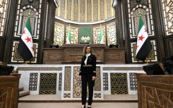 Syria's parliament deputy speaker Madonna Beshara poses inside the parliament in Damascus on July 27, 2026
