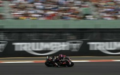 Aprilia Racing's Spanish rider Jorge Martin set a new lap record on his way to pole position for the MotoGP British Grand Prix at Silverstone