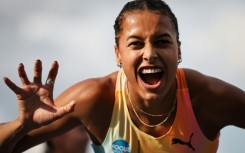Switzerland's Audrey Werro celebrates after winning the 800m at the Paris Diamond League