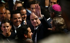 FIFA president Gianni Infantino (C) has failed to see off his many critics and faces an uncertain future