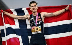 Norway's Jakob Ingebrigtsen celebrates after winning the men's 5,000m at the European Athletics Championships