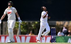 Bangladesh bowler Hasan Mahmud celebrates dismissing Pat Cummins