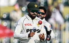 Pakistan captain Babar Azam (front)