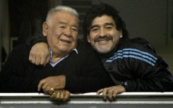 The trial over the death of Argentine football legend Diego Maradona (R) has come to a hold over claims that medical test results presented in court by prosecutors actually belonged to his father, also named Diego (L)