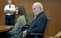 Lindsay Clancy, pictured here in court with her lawyer, Kevin Reddington, was on trial for the murder of her three young children