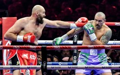 Tyson Fury (left) has challenged Oleksandr Usyk to a third fight