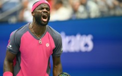 American Frances Tiafoe is through to the US Open semi-finals after a five-set victory over Alex Michelsen